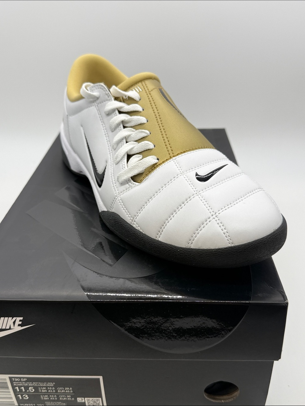 Nike Men’s White and Gold Low-Profile Soccer Sneakers